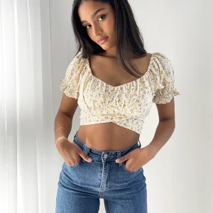 Crop top fleuri noué dans le dos